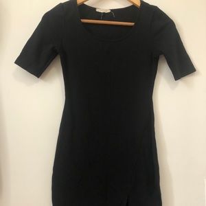 Black scoop neck bodycon dress
